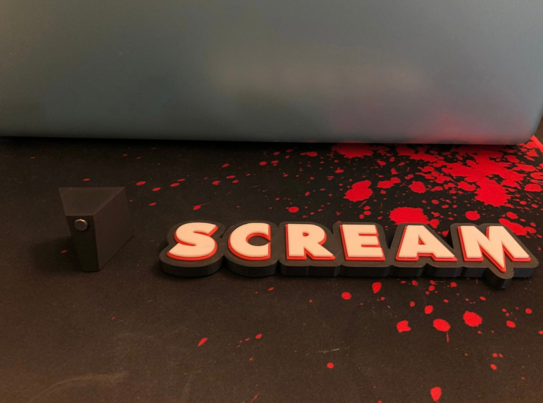 Scream logo/shelf display