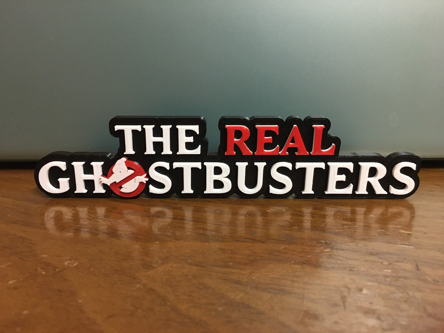 The Real Ghostbusters logo/shelf display