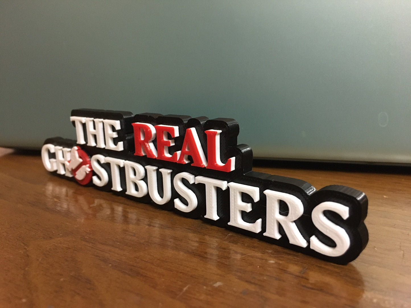 The Real Ghostbusters logo/shelf display