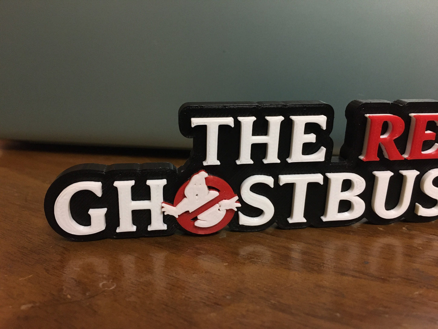 The Real Ghostbusters logo/shelf display