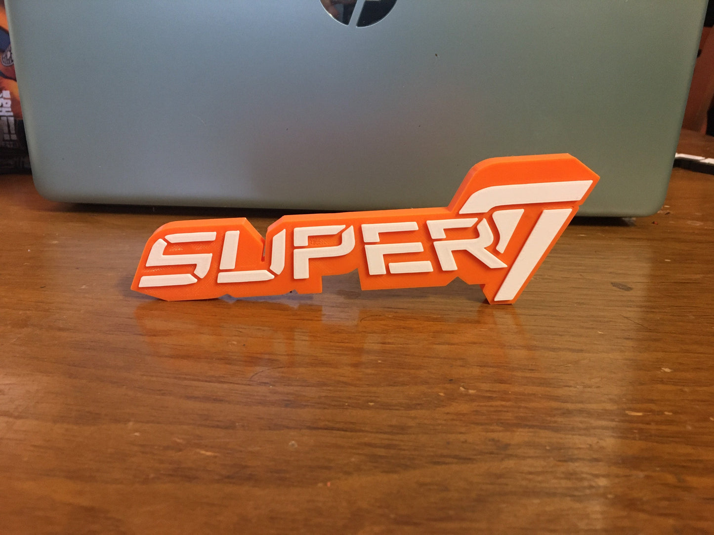 SUPER 7 logo/shelf display