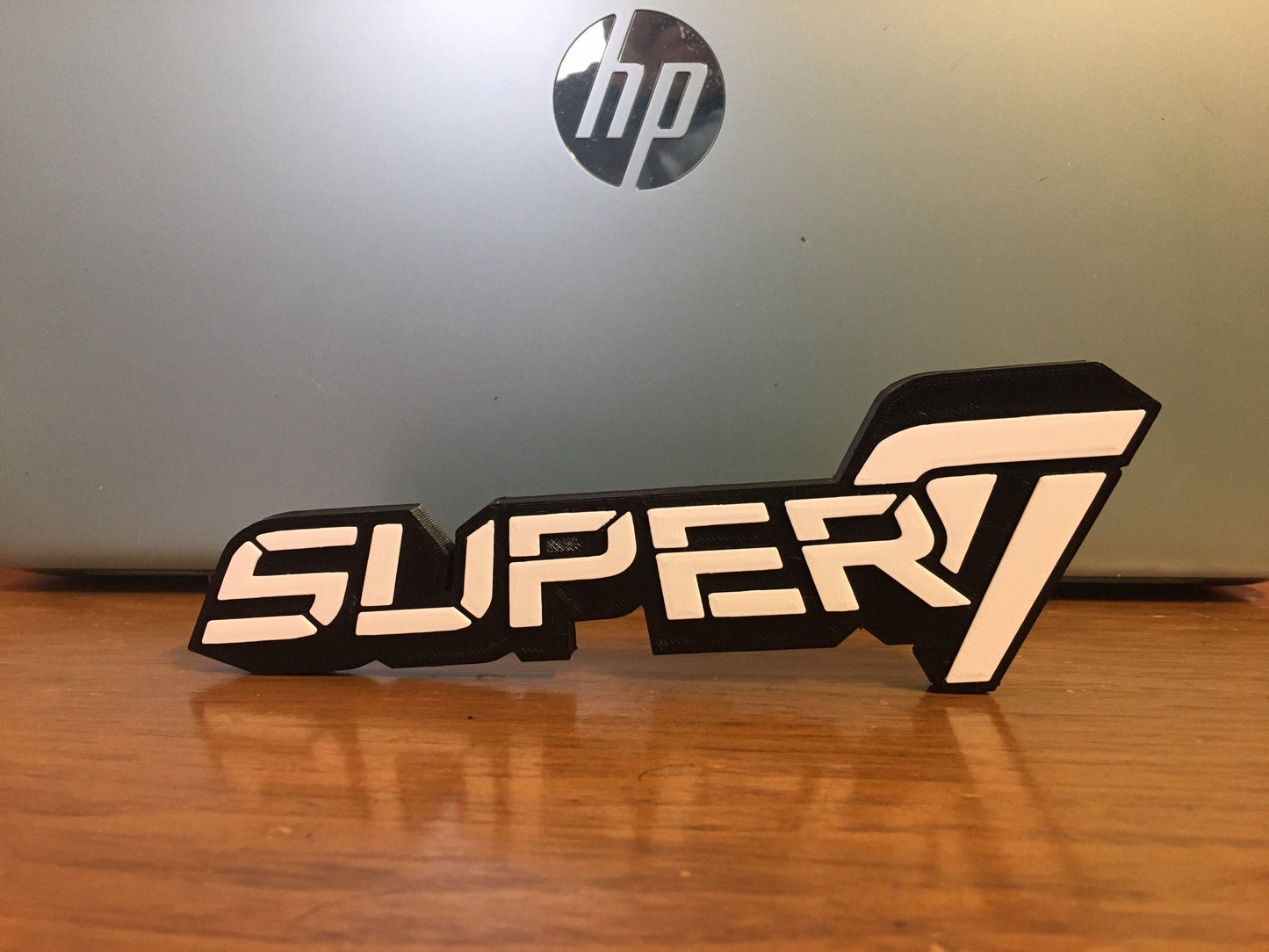 SUPER 7 logo/shelf display