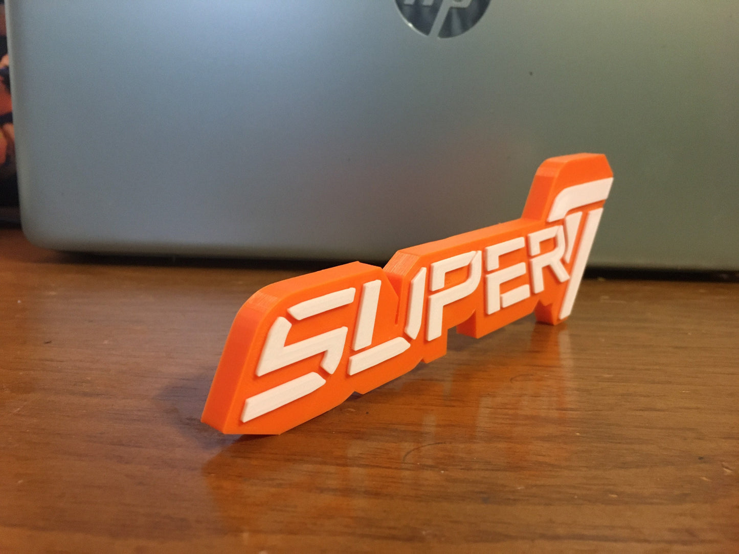 SUPER 7 logo/shelf display