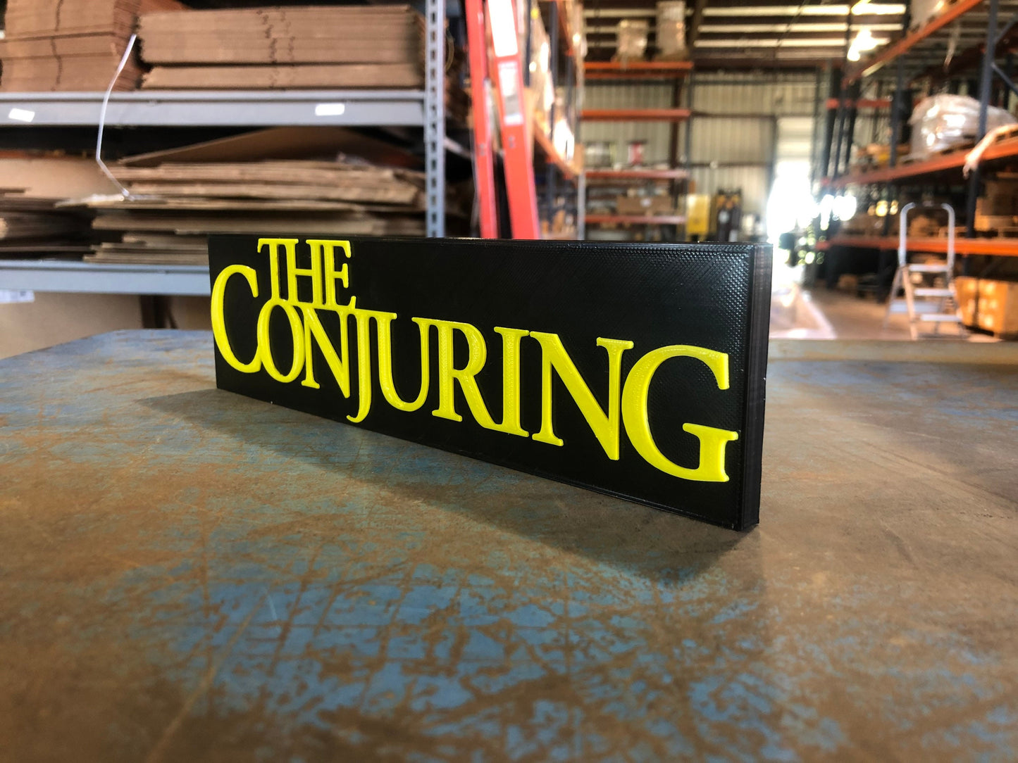 The Conjuring logo/shelf display