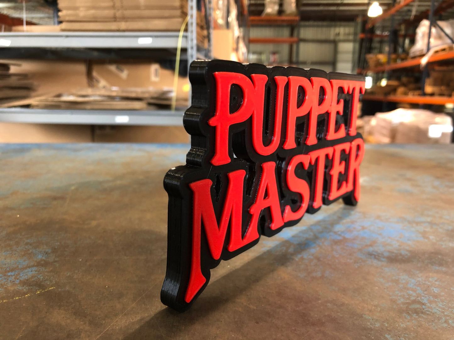 PUPPET MASTER LOGO/shelf display