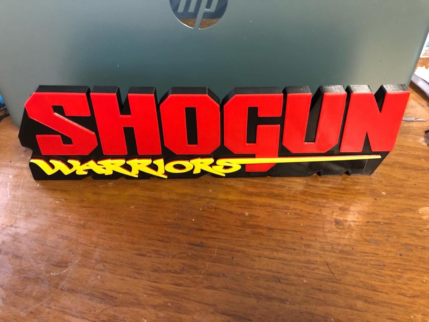 Shogun Warriors logo/shelf display