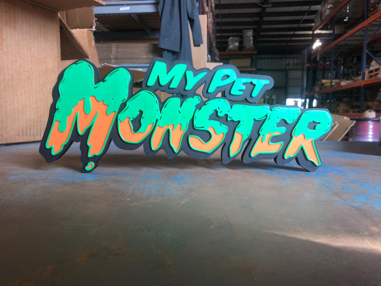 My Pet Monster logo/shelf display