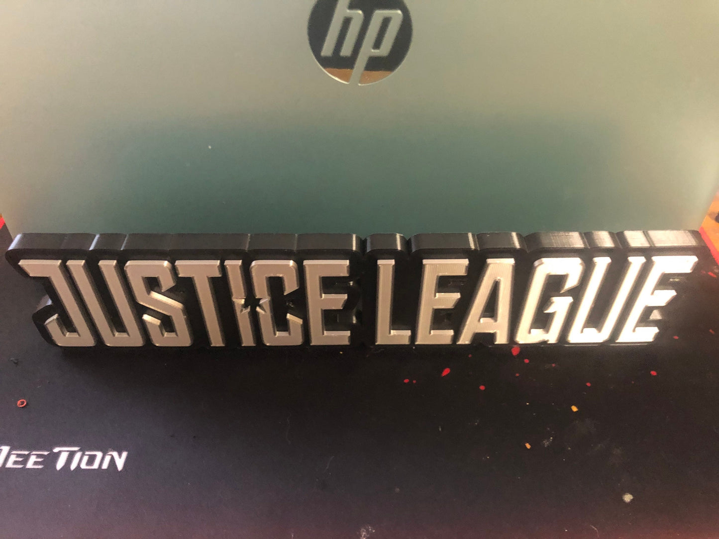 Justice League logo/shelf display