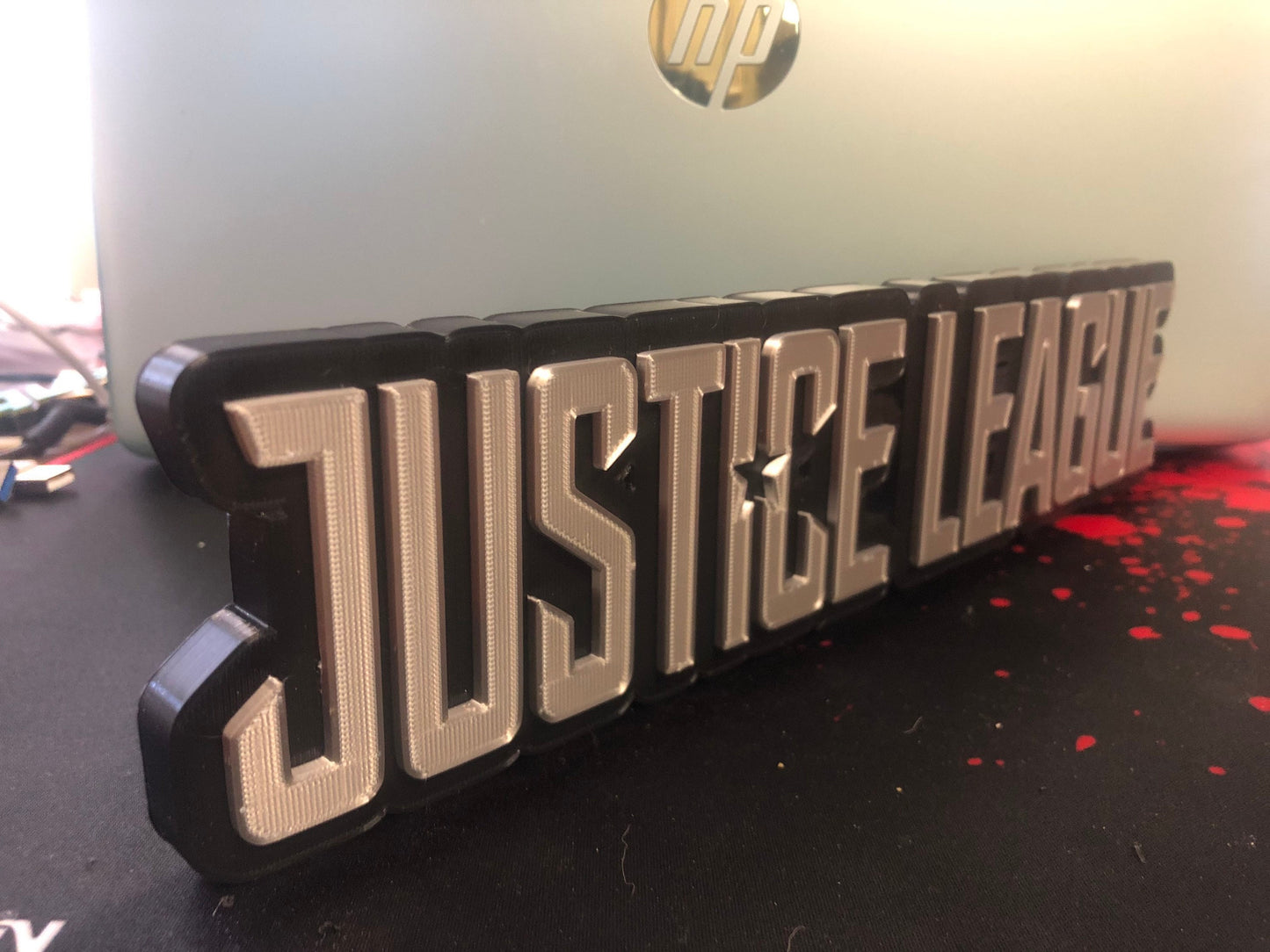 Justice League logo/shelf display