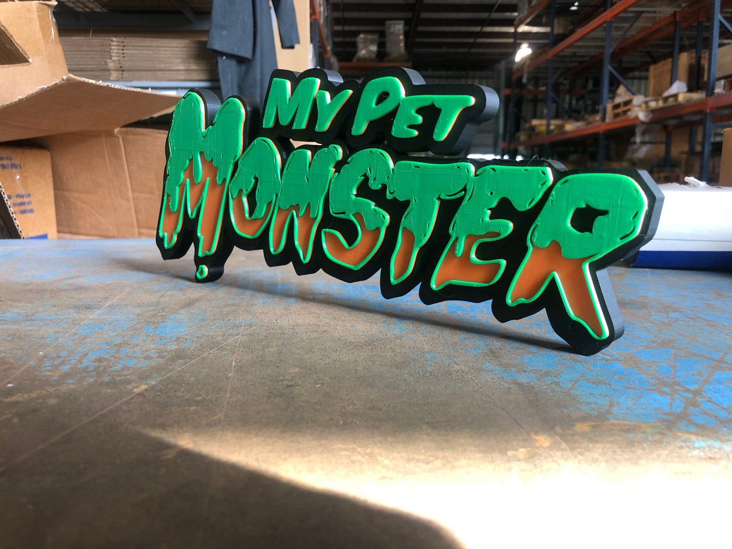 My Pet Monster logo/shelf display