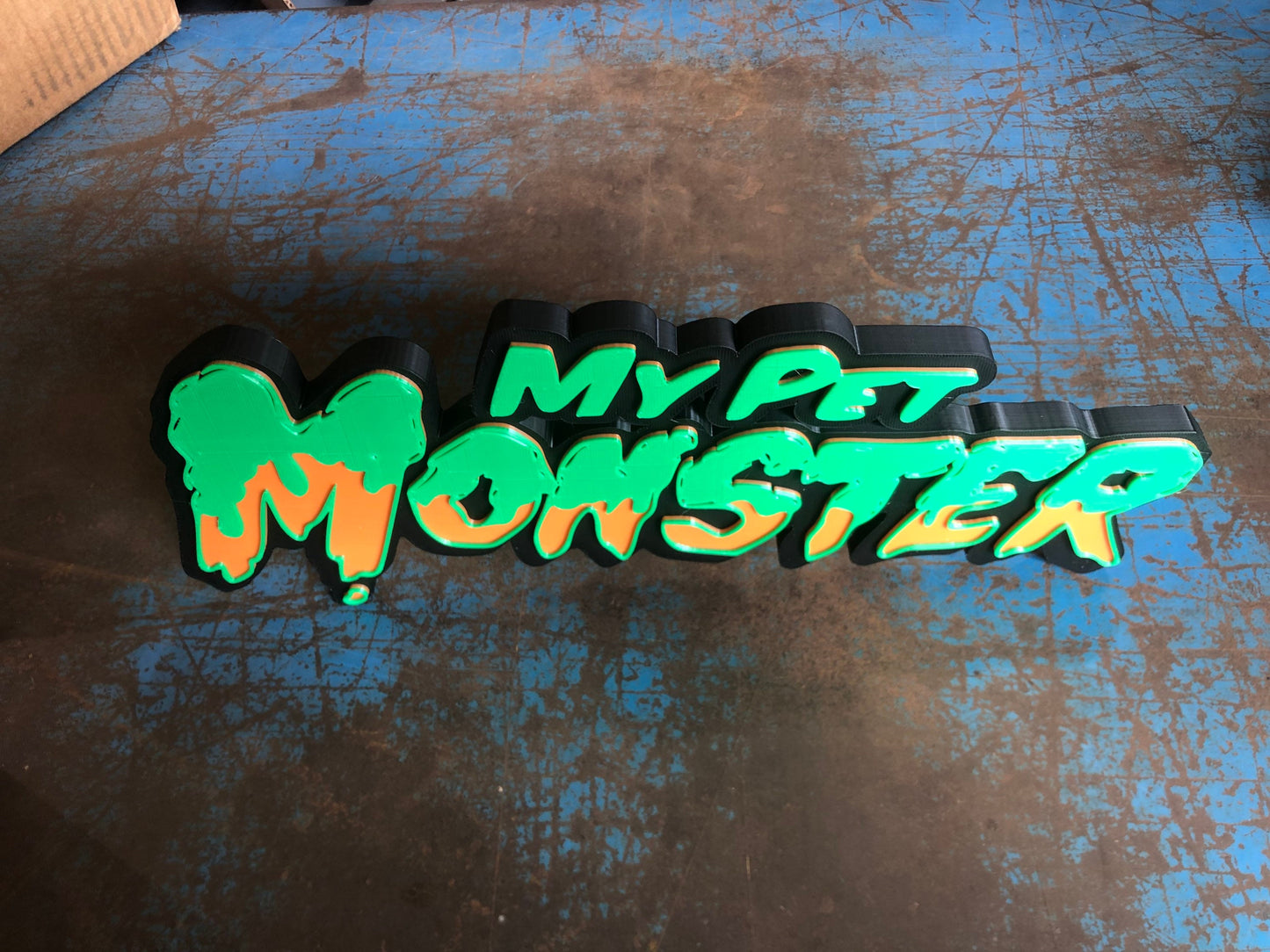 My Pet Monster logo/shelf display