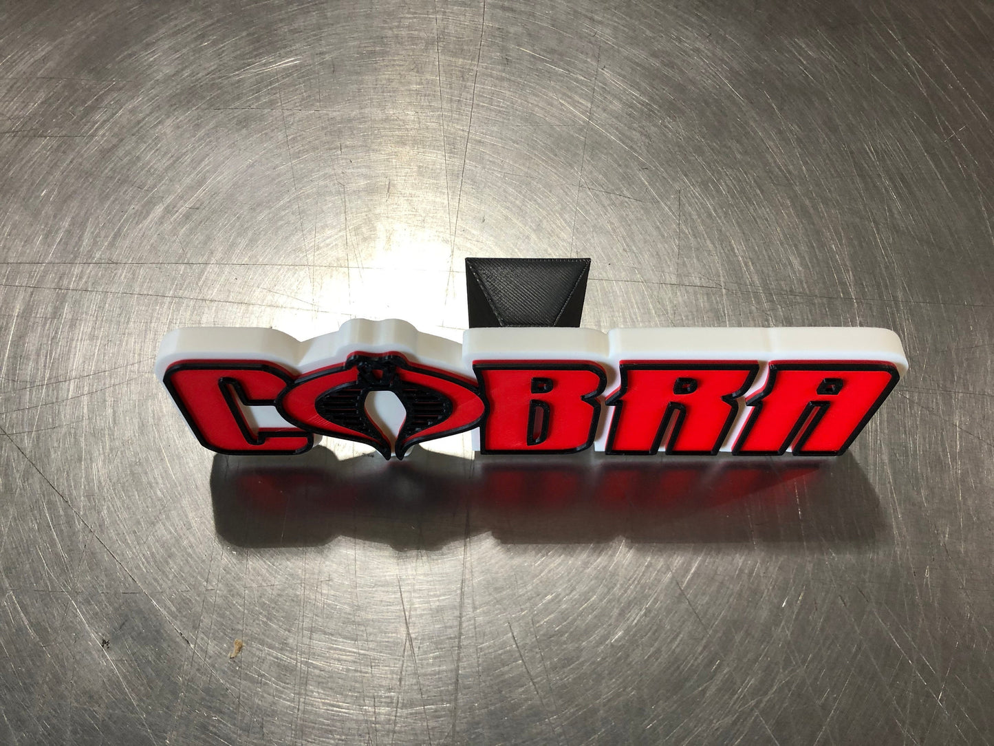 V2 Cobra logo/shelf display