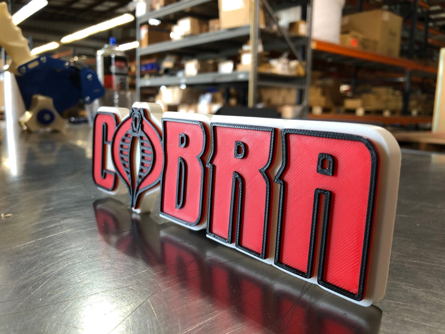 V2 Cobra logo/shelf display