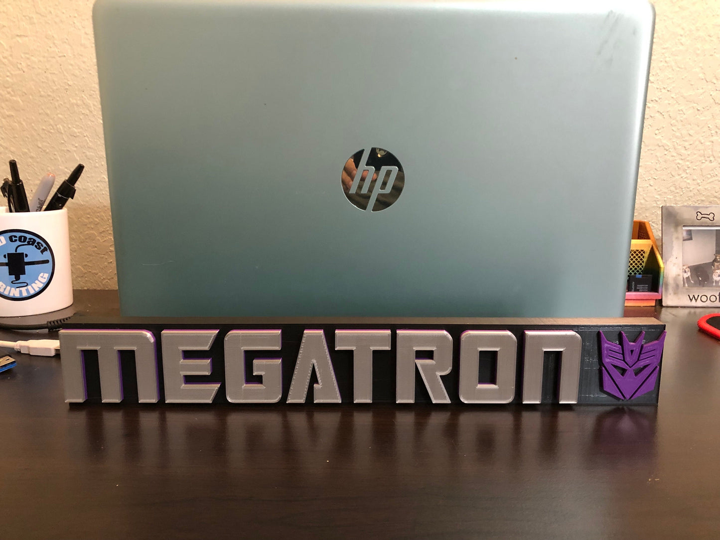 Megatron logo/shelf display