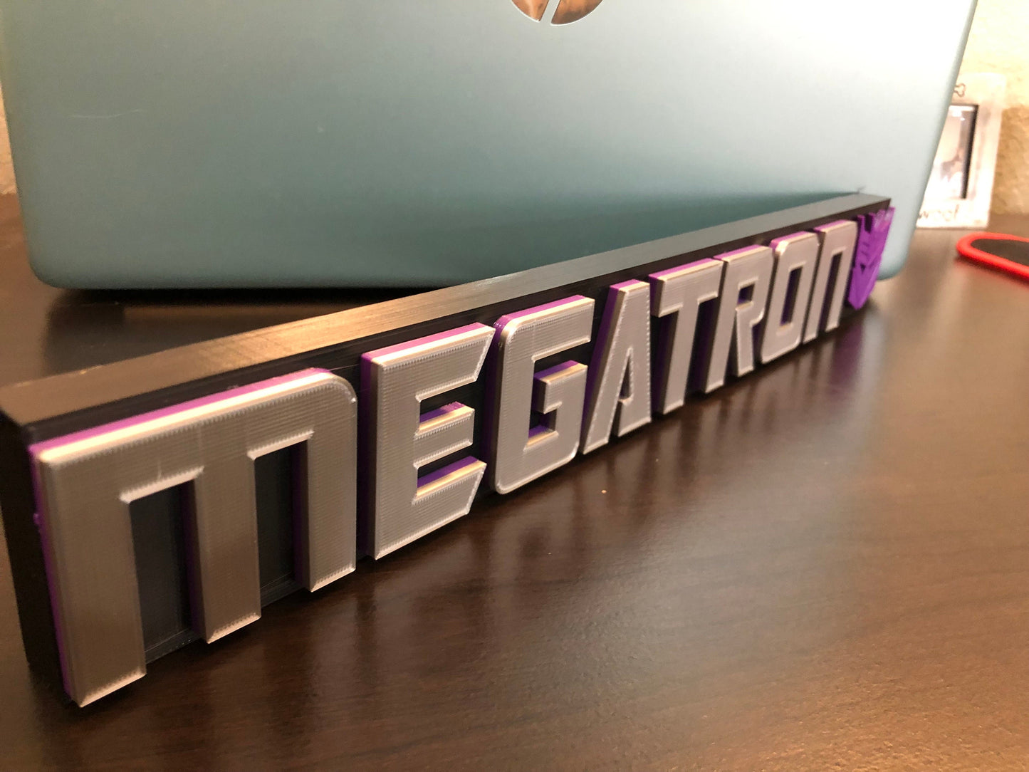 Megatron logo/shelf display