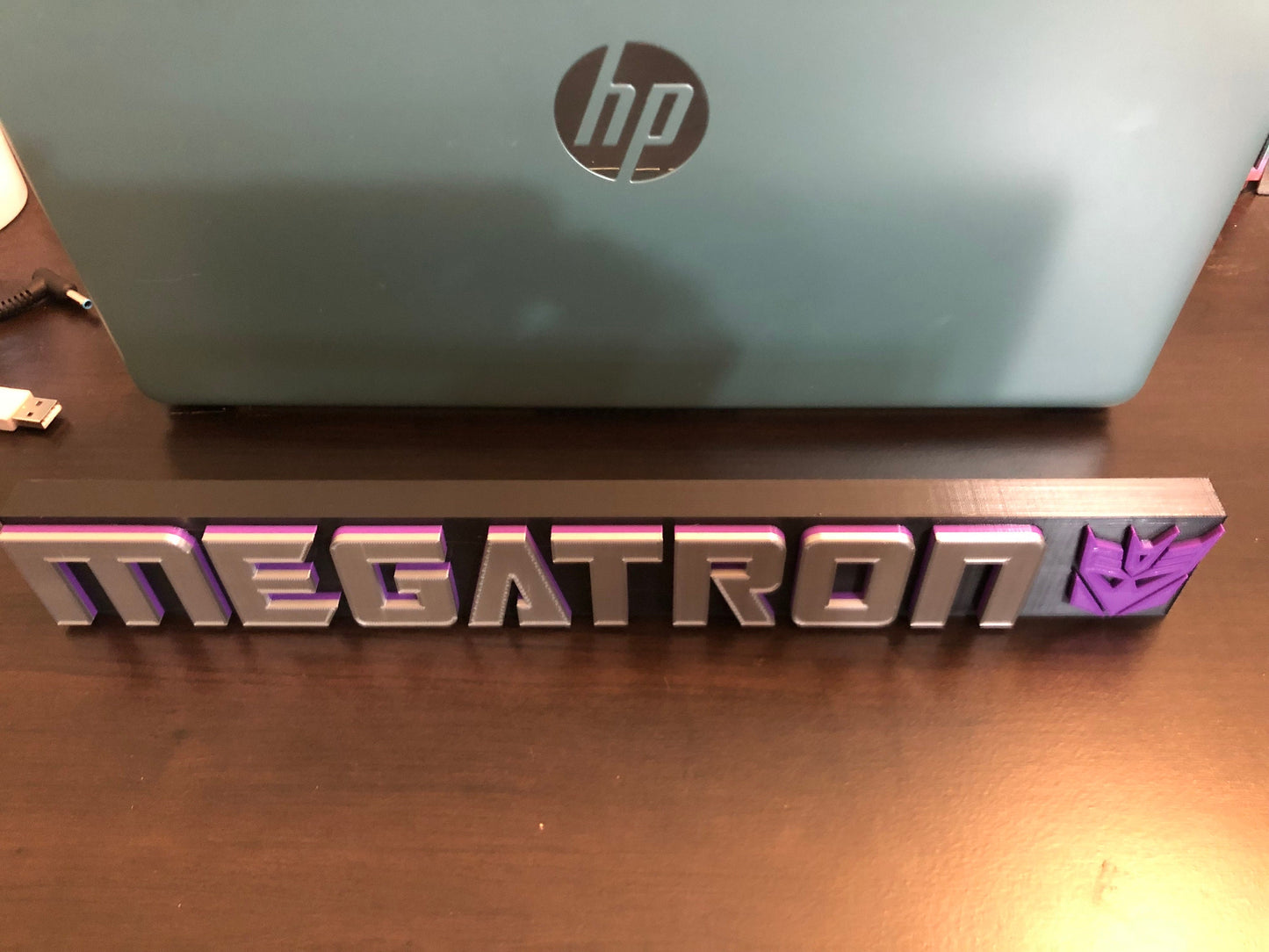 Megatron logo/shelf display