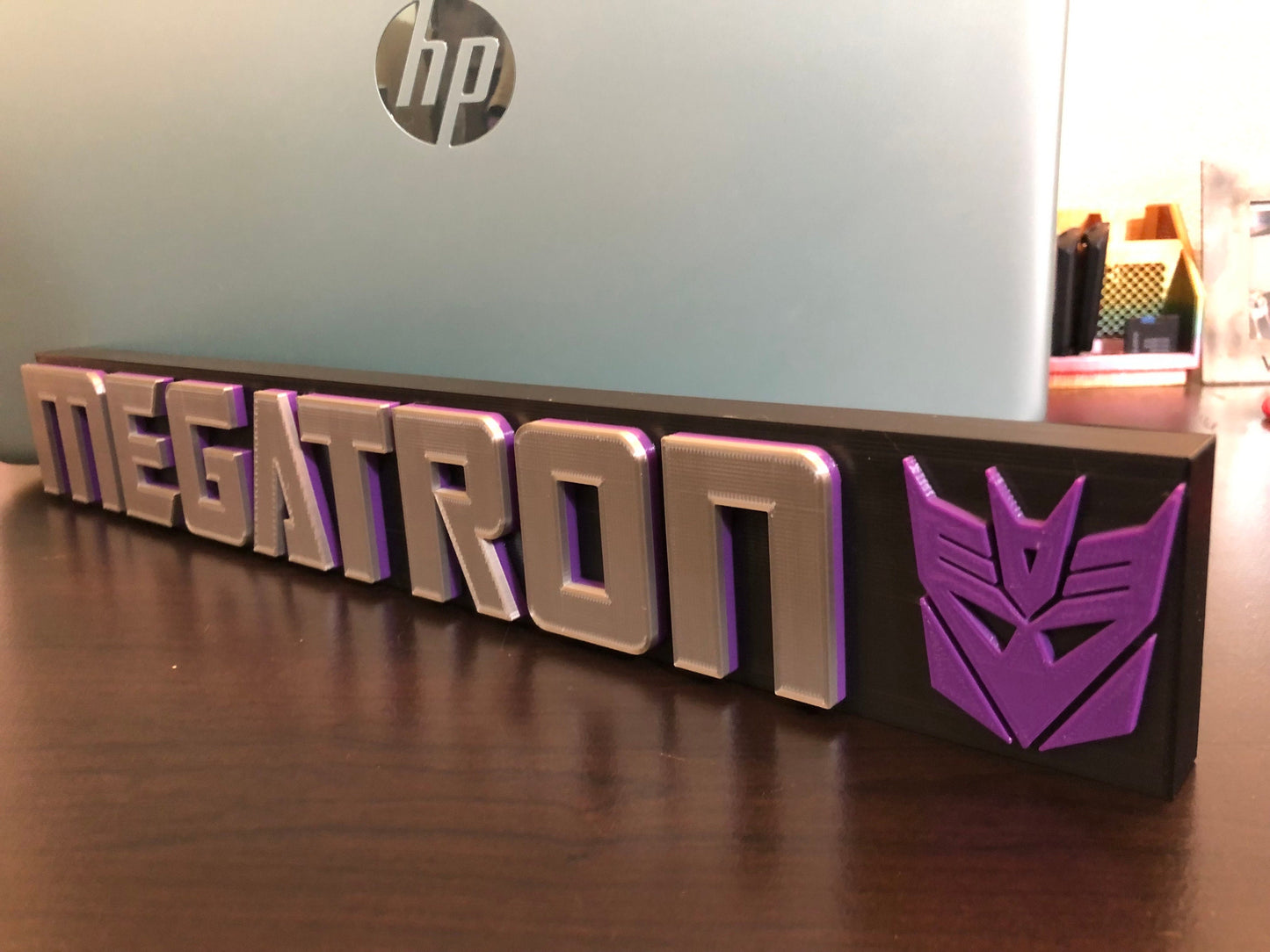 Megatron logo/shelf display