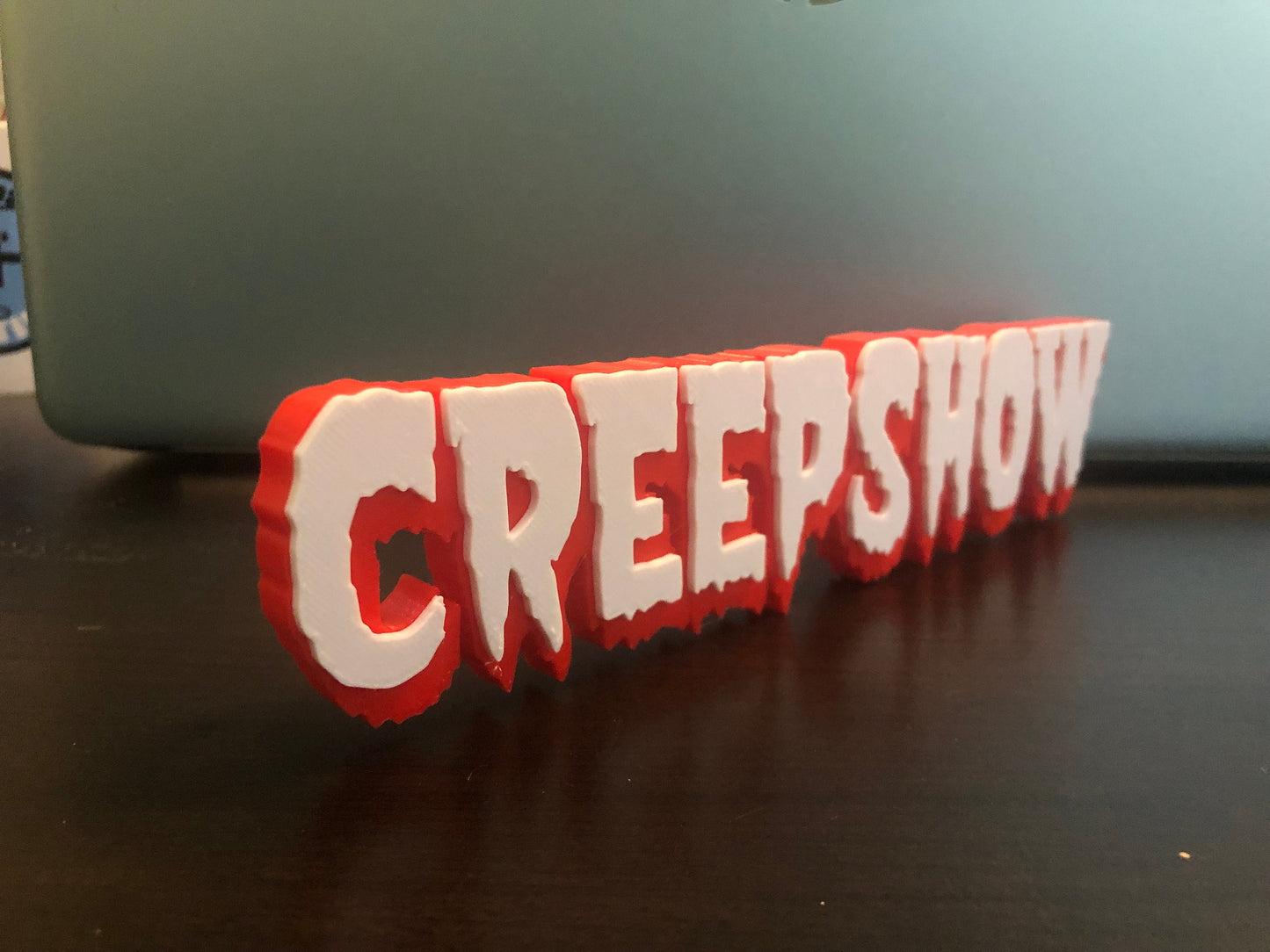 V2 Creepshow logo/shelf display