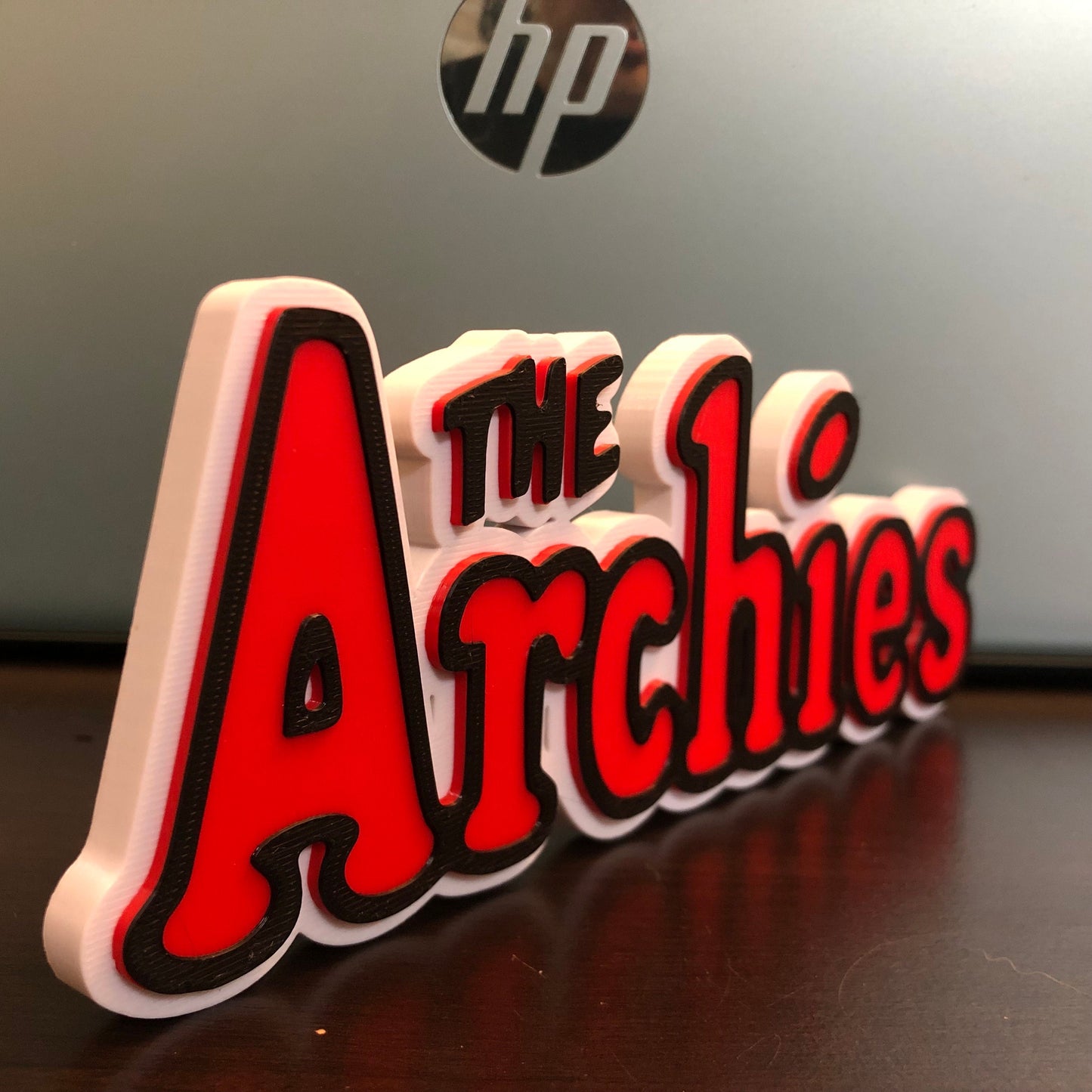 The Archie’s logo/shelf display