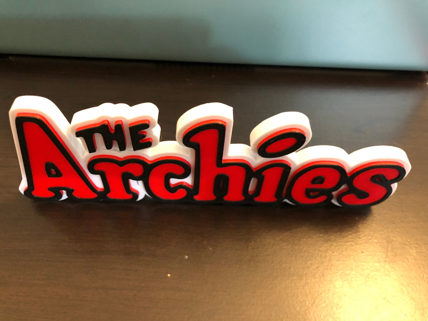 The Archie’s logo/shelf display