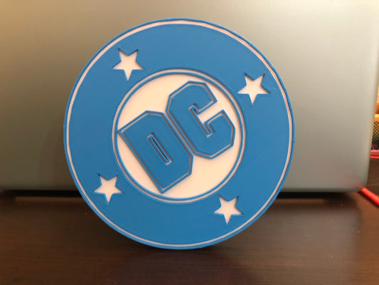 DC Comics logo/shelf display