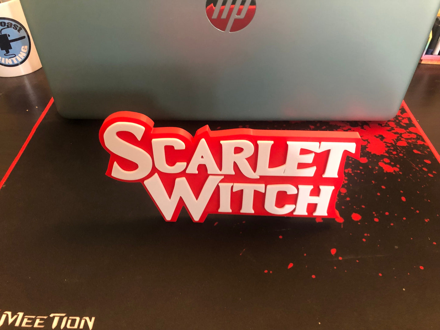 Scarlet Witch logo/shelf display