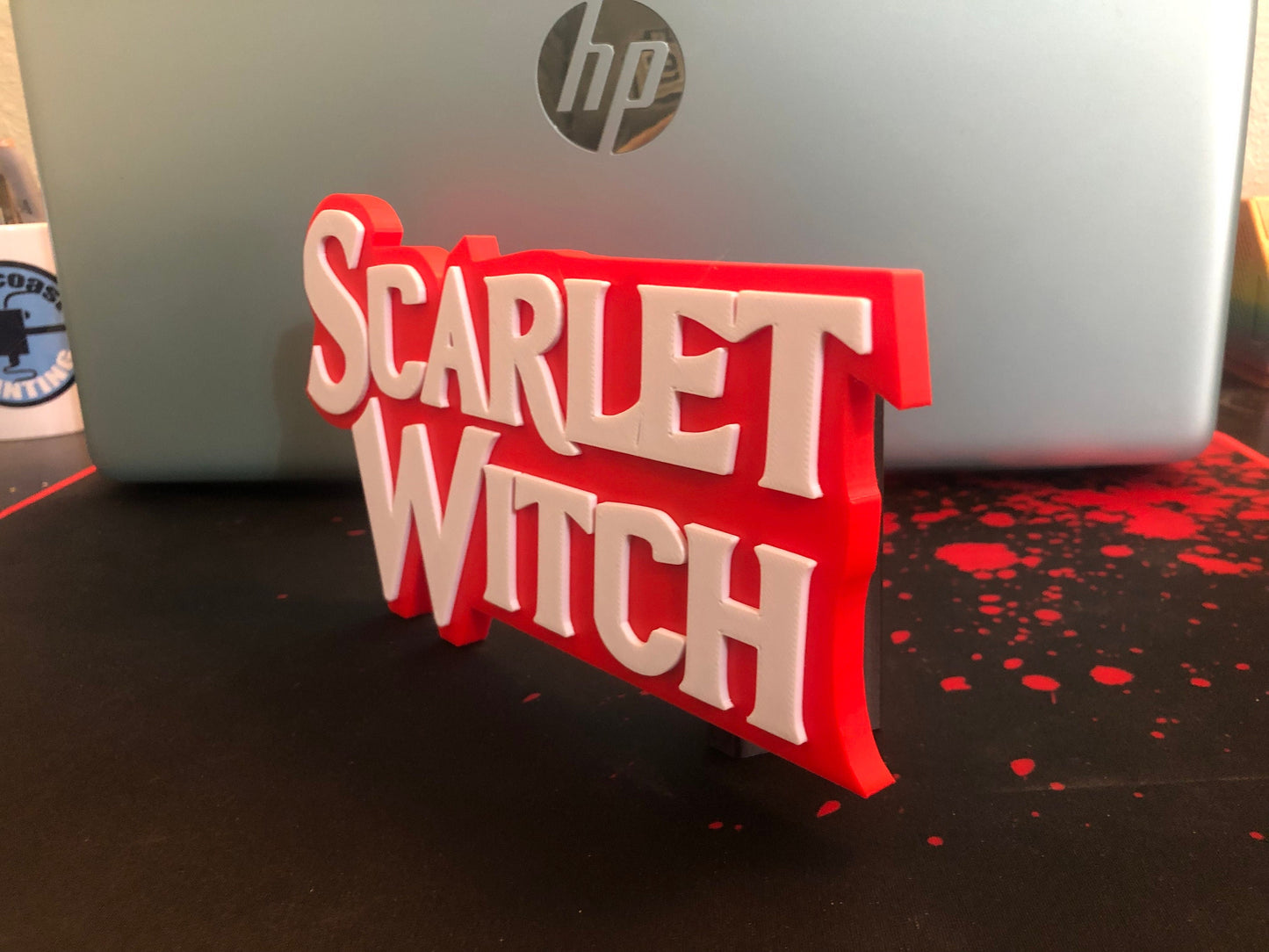 Scarlet Witch logo/shelf display