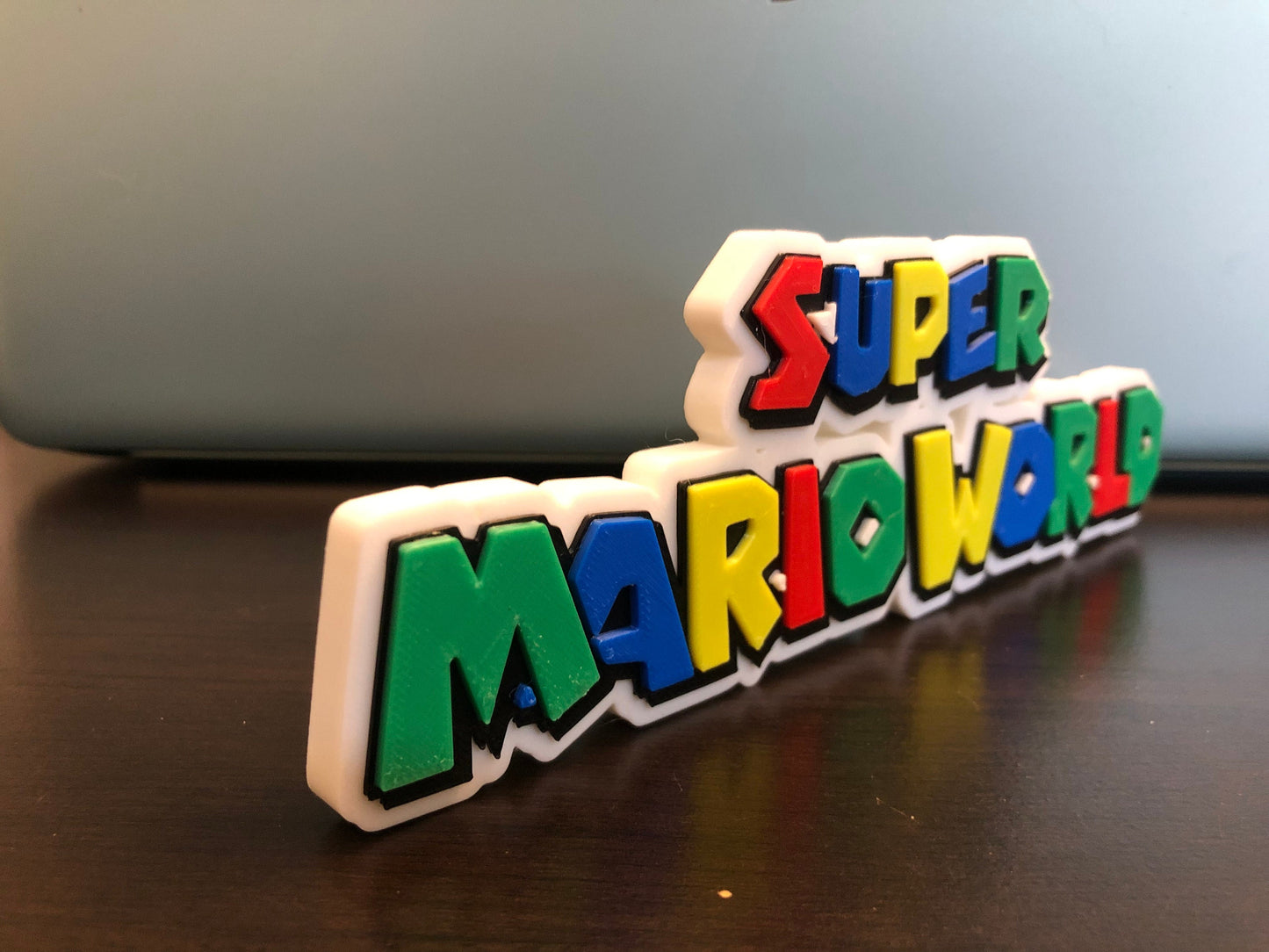 Super Mario World logo/shelf display