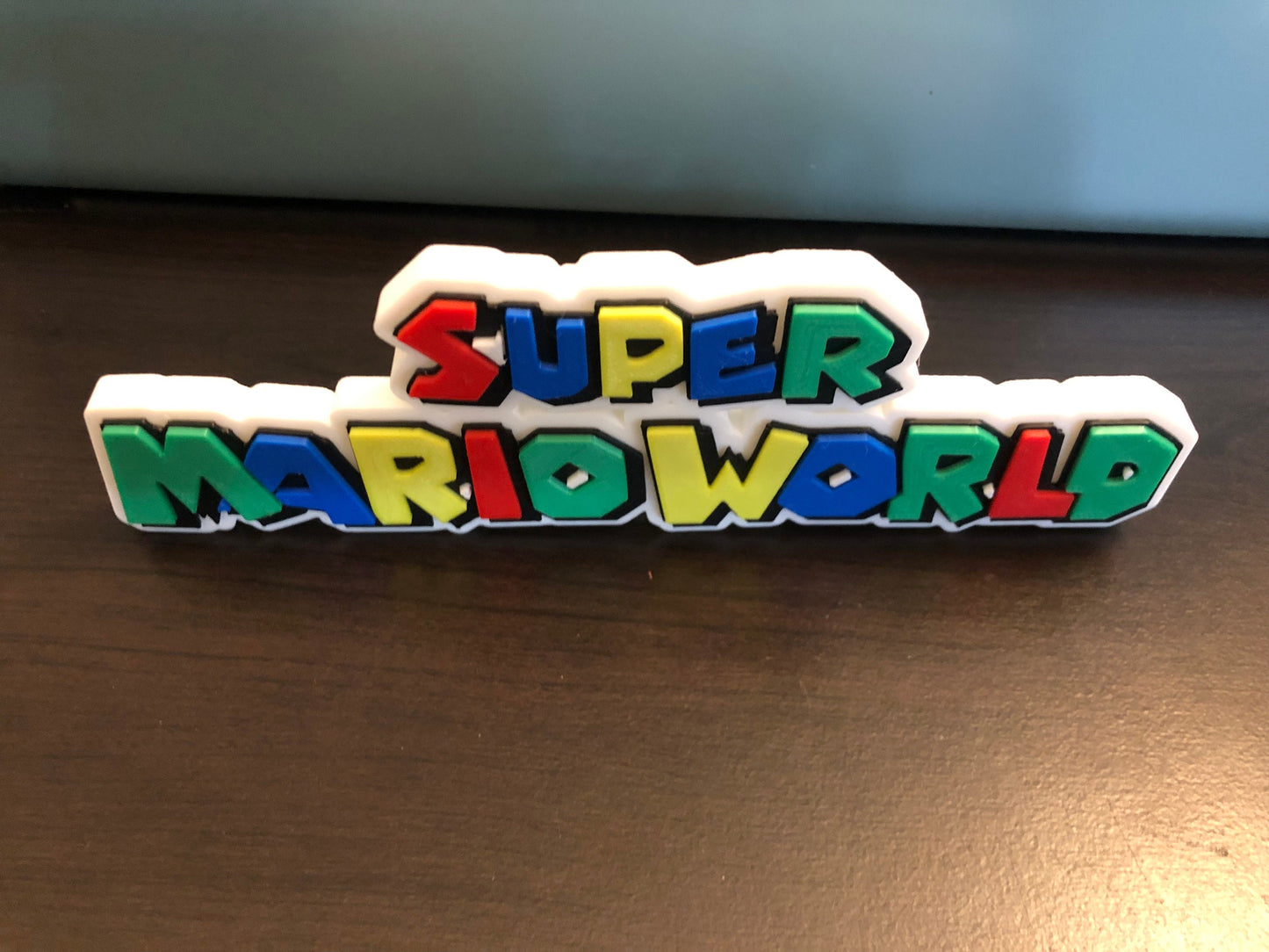 Super Mario World logo/shelf display