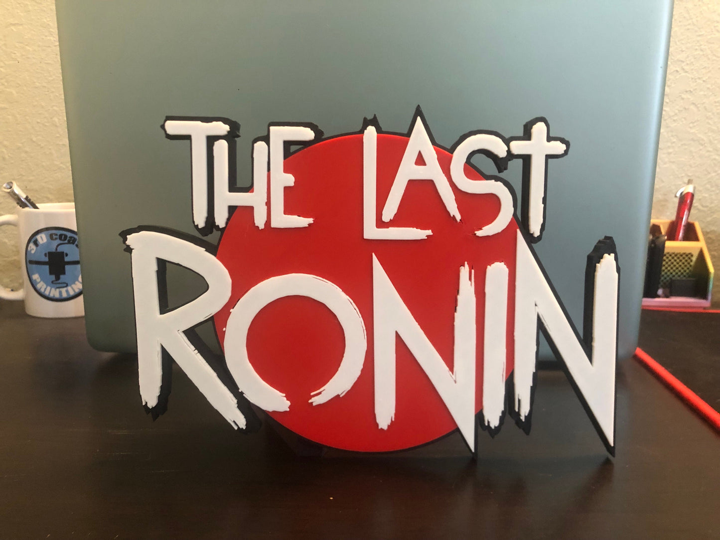 V2 The Last Ronin logo/logo display